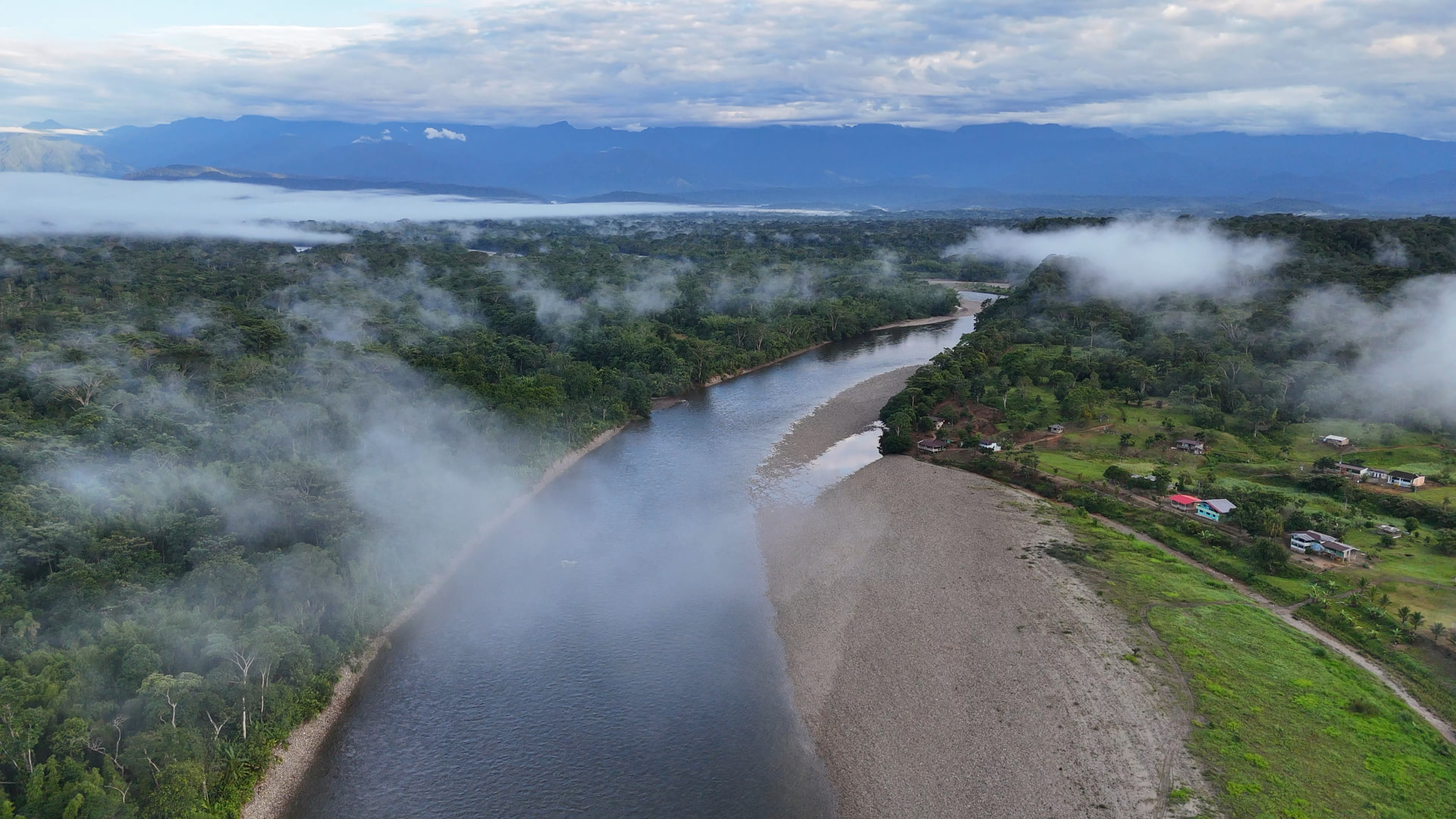 Aerial view of El Diviso along the Putumayo, mist rising over the Amazon